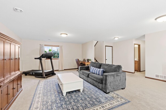 805 Cologne Ln, Waverly, MN 55390 - living area with light carpet, stairs, and baseboards