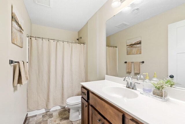 805 Cologne Ln, Waverly, MN 55390 - bathroom with toilet, vanity, stone finish floors, and a shower with shower curtain