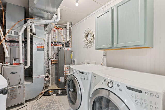 805 Cologne Ln, Waverly, MN 55390 - washroom featuring washer and clothes dryer, cabinet space, and water heater