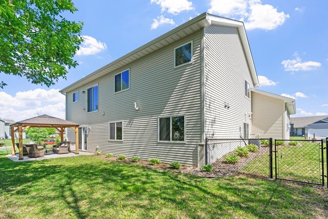 805 Cologne Ln, Waverly, MN 55390 - back of house featuring a gazebo, an outdoor hangout area, a gate, and a patio