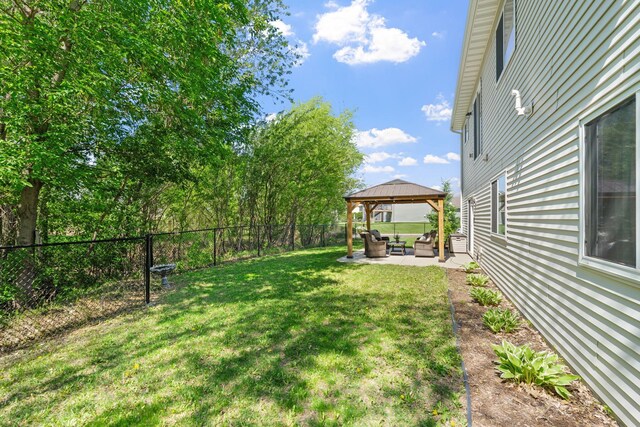805 Cologne Ln, Waverly, MN 55390 - view of yard with a gazebo, a patio, and an outdoor living space