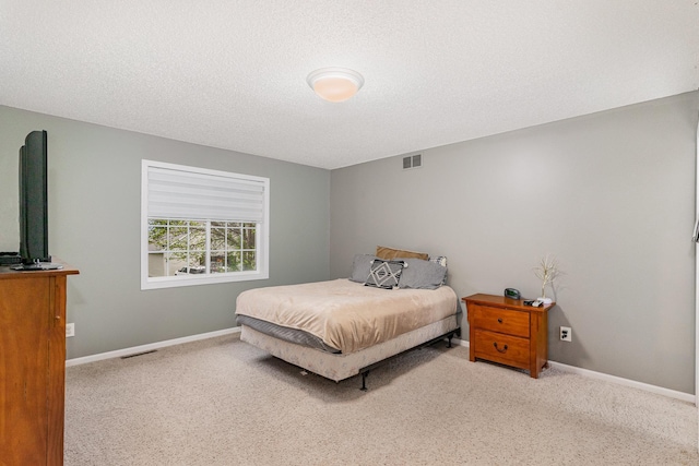5921 200th St W, Farmington, MN 55024 - carpeted bedroom with baseboards and a textured ceiling
