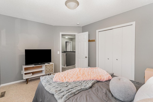 5921 200th St W, Farmington, MN 55024 - bedroom with a closet, carpet floors, and a textured ceiling