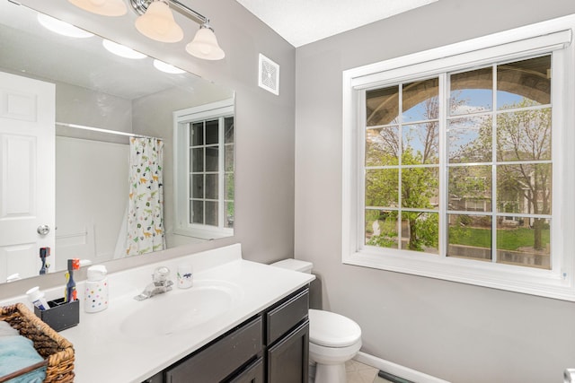 5921 200th St W, Farmington, MN 55024 - bathroom featuring vanity, curtained shower, and tile patterned flooring