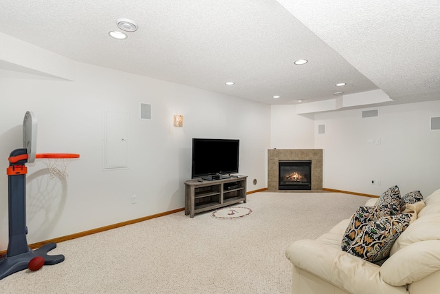 5921 200th St W, Farmington, MN 55024 - carpeted living area with a textured ceiling, recessed lighting, and a tiled fireplace