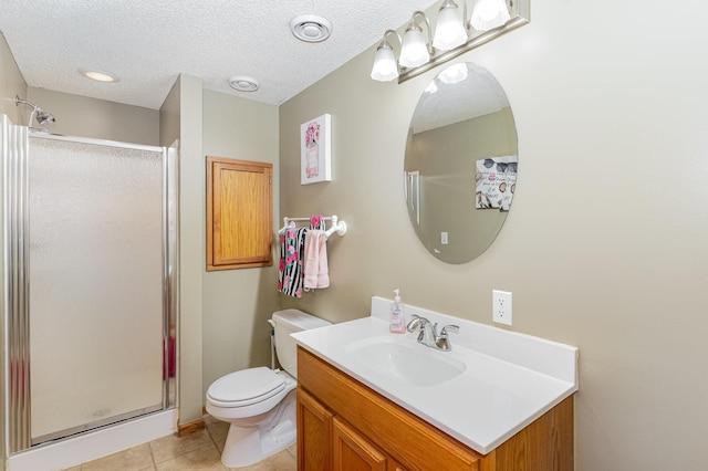 5921 200th St W, Farmington, MN 55024 - bathroom featuring vanity, a stall shower, tile patterned floors, and a textured ceiling
