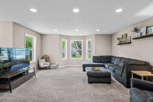 1002 8th Ave N, Princeton, MN 55371 - carpeted living area featuring recessed lighting and baseboards