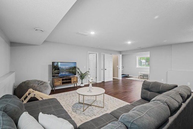 1002 8th Ave N, Princeton, MN 55371 - living area with dark wood-style flooring, recessed lighting, and baseboards