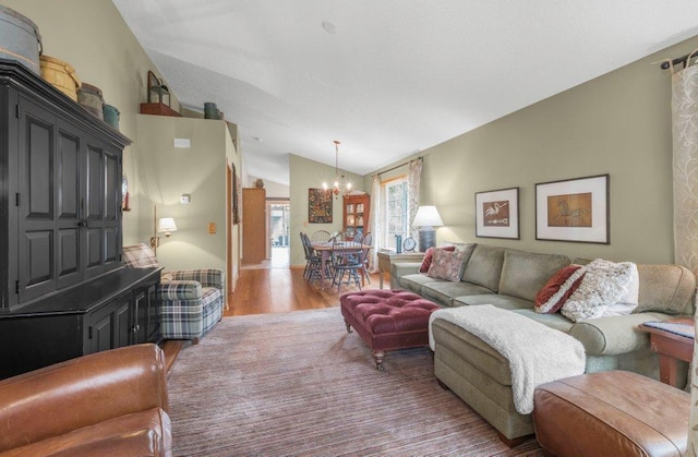 11419 17th St NE, Saint Michael, MN 55376 - living room with a chandelier, lofted ceiling, and wood finished floors