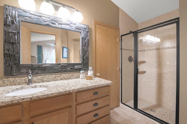 11419 17th St NE, Saint Michael, MN 55376 - full bathroom featuring a shower stall, vanity, and vaulted ceiling
