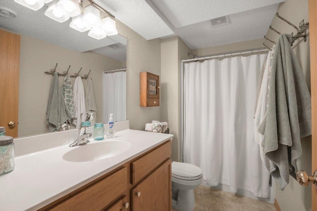 11419 17th St NE, Saint Michael, MN 55376 - bathroom featuring toilet, vanity, tile patterned flooring, a shower with curtain, and a textured ceiling