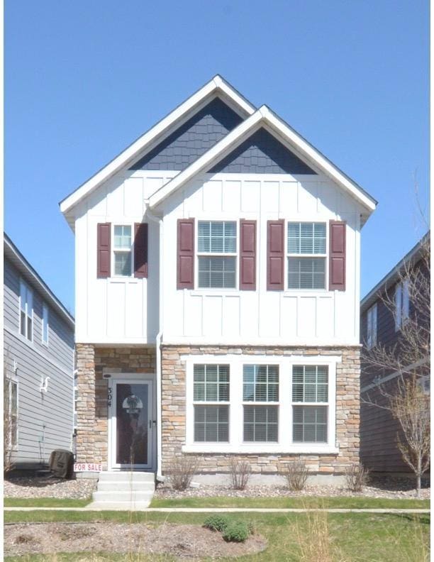 304 Rum River Way, Anoka, MN 55303 - craftsman house featuring stone siding and board and batten siding