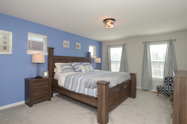 304 Rum River Way, Anoka, MN 55303 - bedroom with light carpet and baseboards