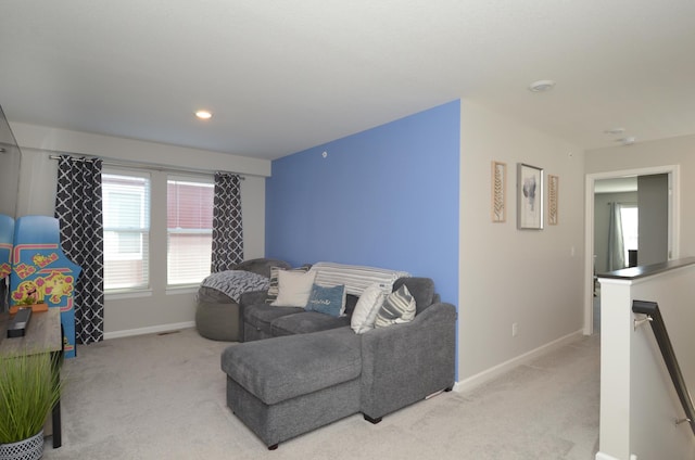 304 Rum River Way, Anoka, MN 55303 - sitting room with light carpet, baseboards, an upstairs landing, and recessed lighting