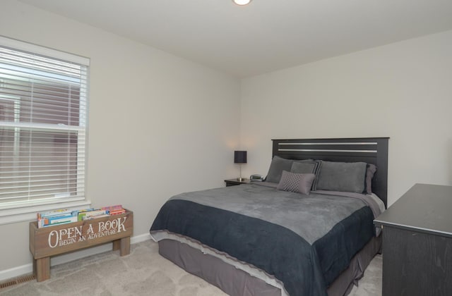 304 Rum River Way, Anoka, MN 55303 - bedroom featuring carpet floors and baseboards