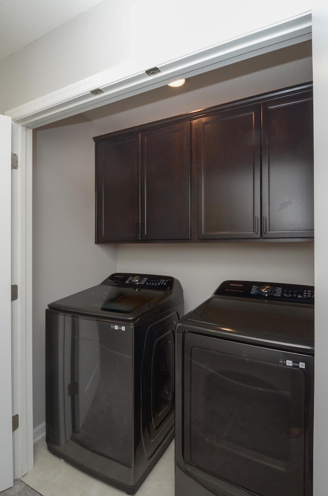 304 Rum River Way, Anoka, MN 55303 - laundry area featuring separate washer and dryer and cabinet space
