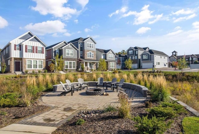 304 Rum River Way, Anoka, MN 55303 - view of patio / terrace with a residential view and a fire pit