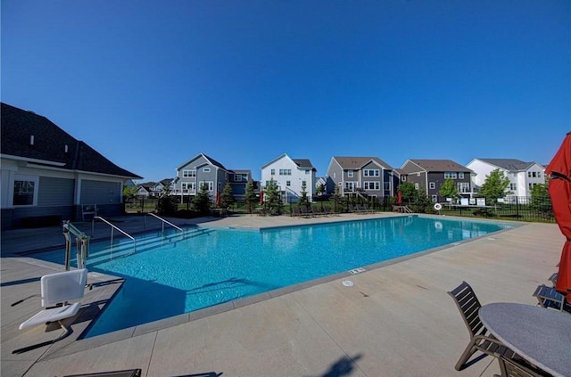 14778 50th St NE, Saint Michael, MN 55376 - community pool featuring a residential view and a patio area