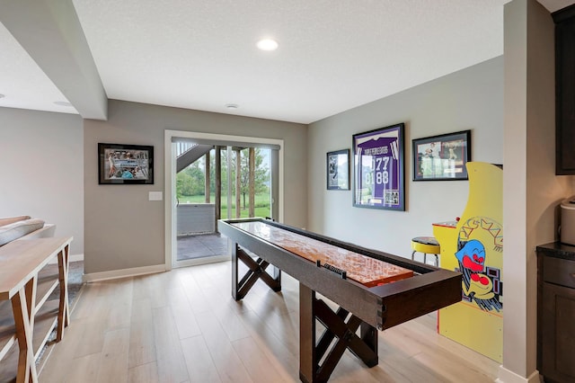 14778 50th St NE, Saint Michael, MN 55376 - rec room with baseboards, light wood finished floors, and recessed lighting