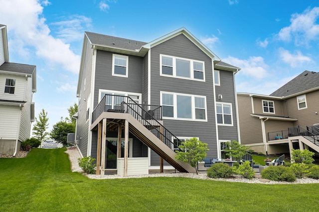 14778 50th St NE, Saint Michael, MN 55376 - rear view of property with stairs, a yard, a deck, and central AC