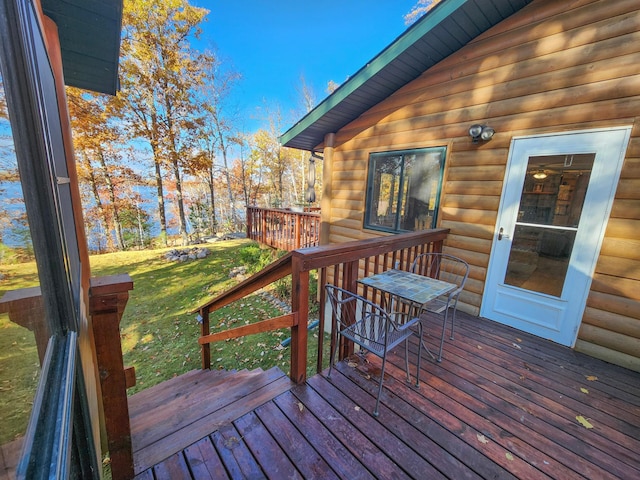 1910 Longwood Point Rd NE, Outing, MN 56662 - wooden terrace with a yard