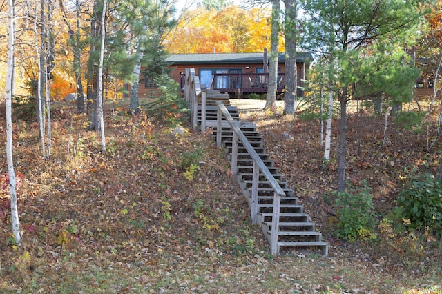 1910 Longwood Point Rd NE, Outing, MN 56662 - view of yard with stairs and a deck