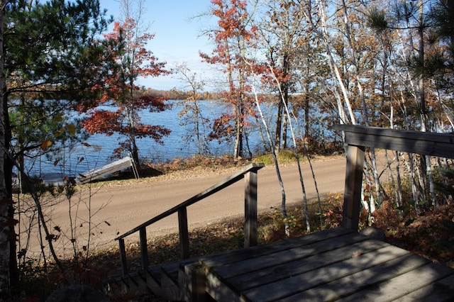 1910 Longwood Point Rd NE, Outing, MN 56662 - wooden terrace with a water view