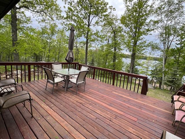1910 Longwood Point Rd NE, Outing, MN 56662 - deck with outdoor dining space