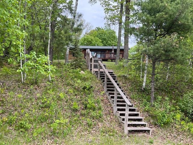 1910 Longwood Point Rd NE, Outing, MN 56662 - view of yard featuring stairs and a deck