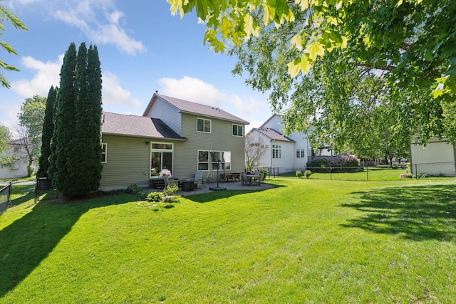 1780 Quail Dr, Shakopee, MN 55379 - back of house featuring a patio area