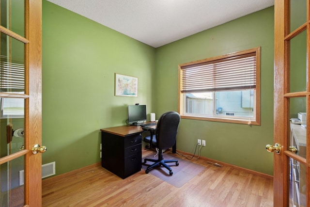 1780 Quail Dr, Shakopee, MN 55379 - home office with light wood-style flooring and baseboards