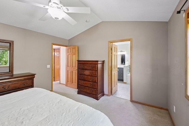 1780 Quail Dr, Shakopee, MN 55379 - bedroom with light carpet, vaulted ceiling, baseboards, and ceiling fan