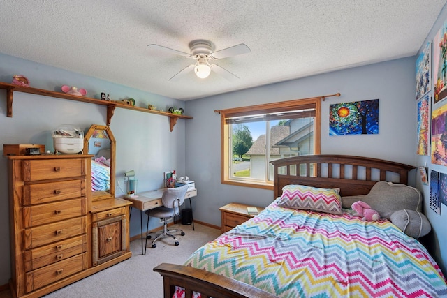 1780 Quail Dr, Shakopee, MN 55379 - bedroom featuring light colored carpet, a textured ceiling, a ceiling fan, and baseboards
