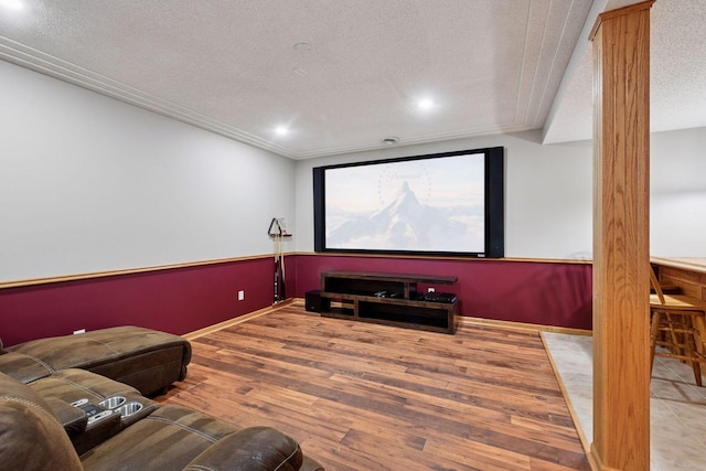 1780 Quail Dr, Shakopee, MN 55379 - cinema featuring a textured ceiling, wood finished floors, decorative columns, baseboards, and recessed lighting