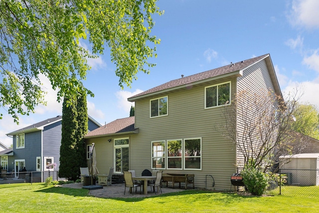 1780 Quail Dr, Shakopee, MN 55379 - rear view of house featuring entry steps, a patio, and a shingled roof