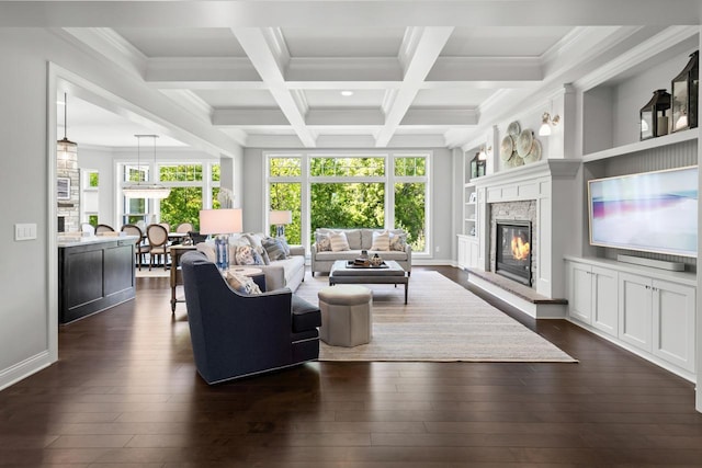5980 Prestwick Ct, Shorewood, MN 55331 - living room with a glass covered fireplace, plenty of natural light, dark wood-style flooring, beam ceiling, and ornamental molding