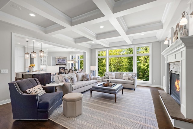 5980 Prestwick Ct, Shorewood, MN 55331 - living room with dark wood-type flooring, a glass covered fireplace, beamed ceiling, coffered ceiling, and recessed lighting