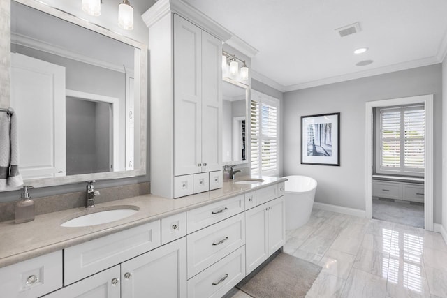 5980 Prestwick Ct, Shorewood, MN 55331 - full bathroom featuring healthy amount of natural light, double vanity, a freestanding bath, baseboards, and crown molding