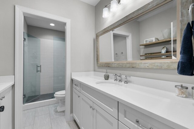 5980 Prestwick Ct, Shorewood, MN 55331 - full bath featuring a stall shower, vanity, toilet, and tile patterned floors