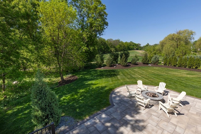 5980 Prestwick Ct, Shorewood, MN 55331 - view of green lawn with an outdoor fire pit and a patio