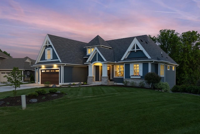 5980 Prestwick Ct, Shorewood, MN 55331 - view of front of property featuring a lawn, a garage, concrete driveway, and a shingled roof