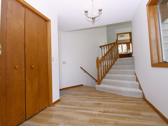 538 Nordic Ln, Troy Twp, WI 54016 - stairs featuring wood finished floors and baseboards