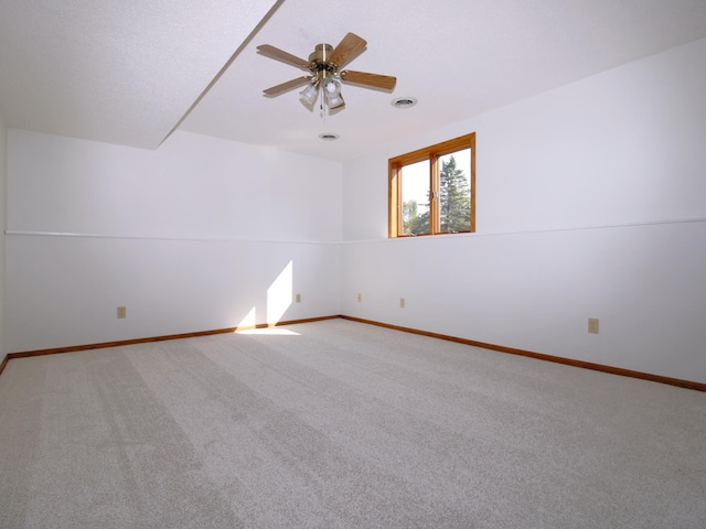 538 Nordic Ln, Troy Twp, WI 54016 - empty room featuring baseboards, ceiling fan, and light carpet