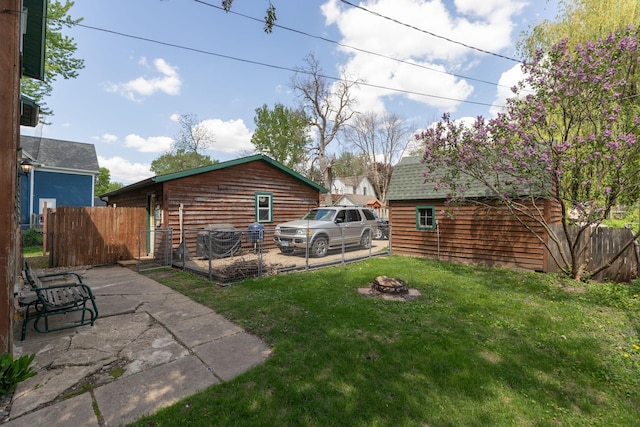210 1st St SE, Hayfield, MN 55940 - view of yard with a fire pit