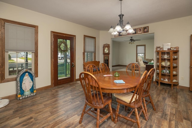 210 1st St SE, Hayfield, MN 55940 - dining room with a chandelier, wood finished floors, baseboards, and ceiling fan
