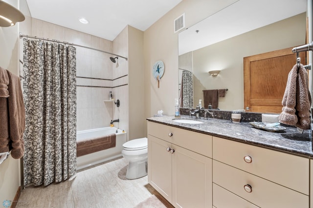 300 Broadway N Unit 204, Fargo, ND 58102 - full bathroom with toilet, shower / bathtub combination with curtain, vanity, and tile patterned flooring