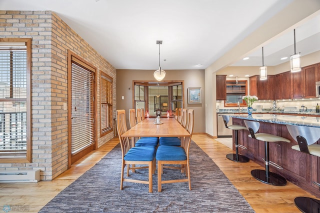 300 Broadway N Unit 204, Fargo, ND 58102 - dining room featuring light wood-type flooring, baseboards, and recessed lighting