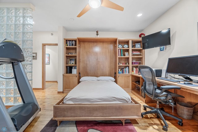 300 Broadway N Unit 204, Fargo, ND 58102 - bedroom with wood finished floors, an office area, and a ceiling fan