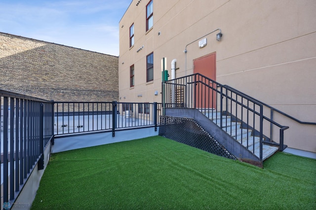 300 Broadway N Unit 204, Fargo, ND 58102 - view of yard featuring stairway