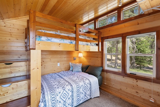 6363 Circle Rd, Danbury, WI 54830 - bedroom featuring wooden walls, wood ceiling, carpet floors, and vaulted ceiling